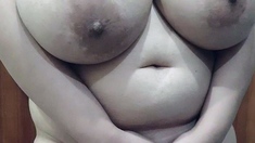 Busty curly brunette with big boobs fucks on couch