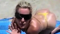 MILF take a facial on the beach